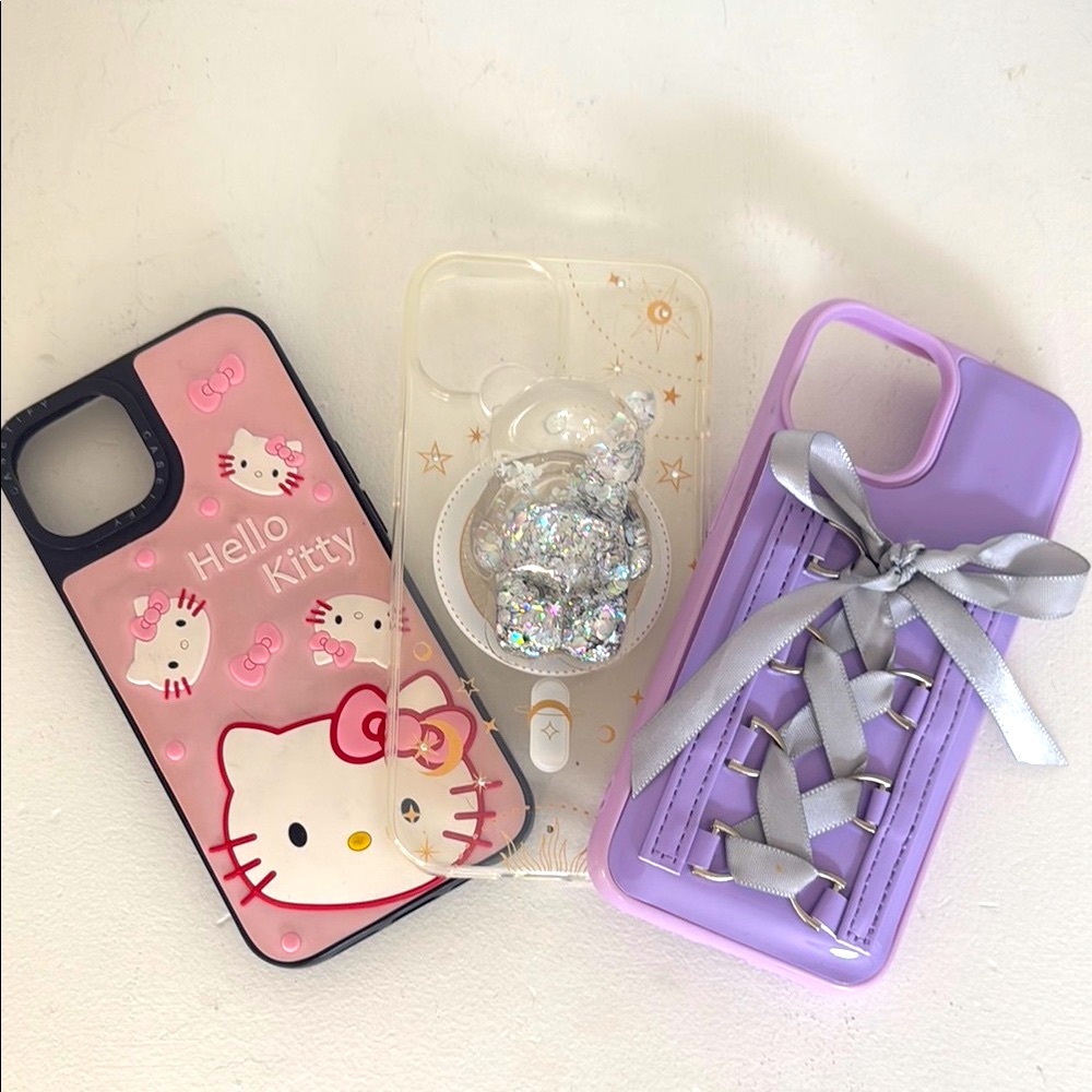 Hello Kitty Black and Purple Phone 15 Cases with Rhinestone Embellishments